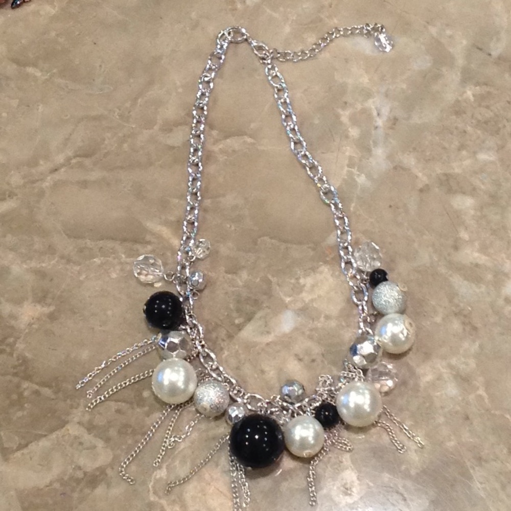 Claire's silver statement baroque pearl necklace.